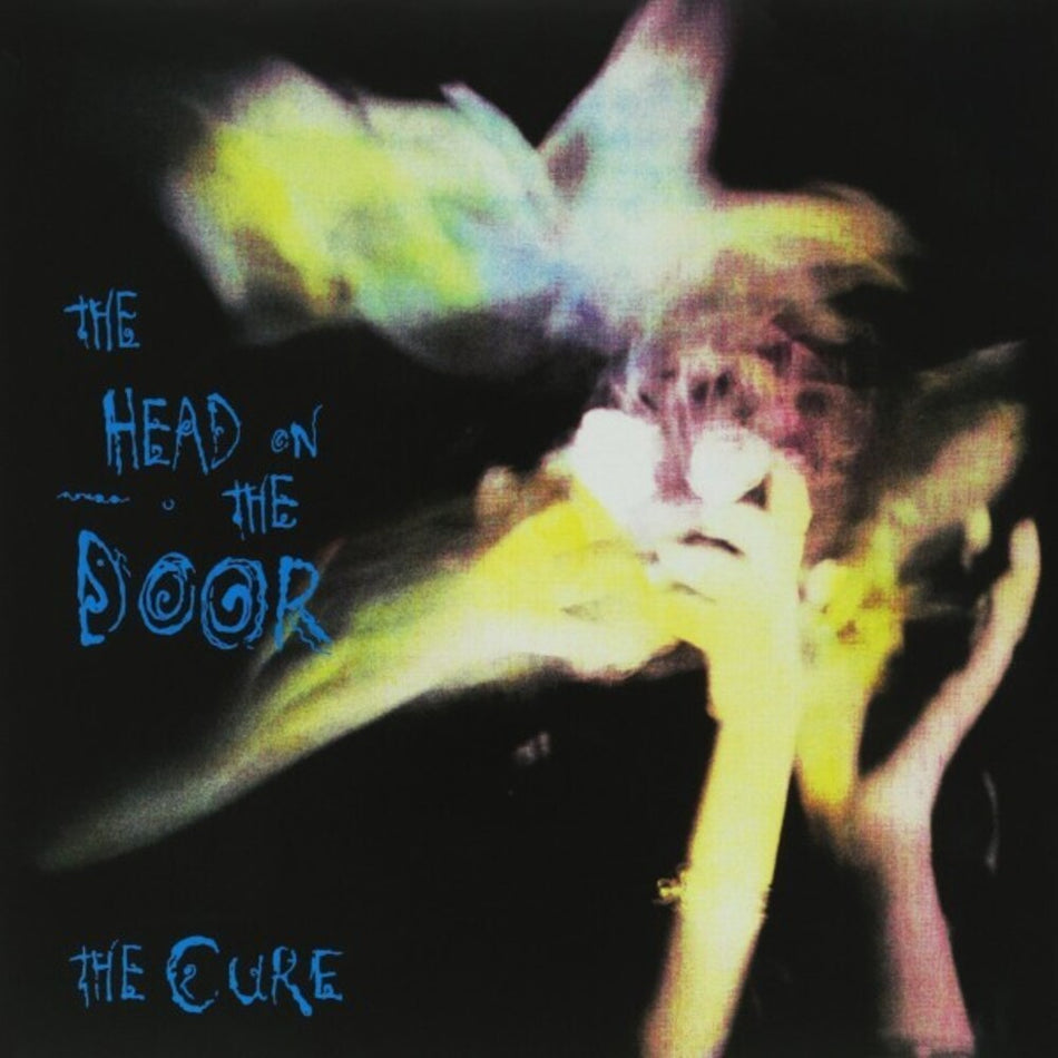 the album cover for The Cure - Head on the Door