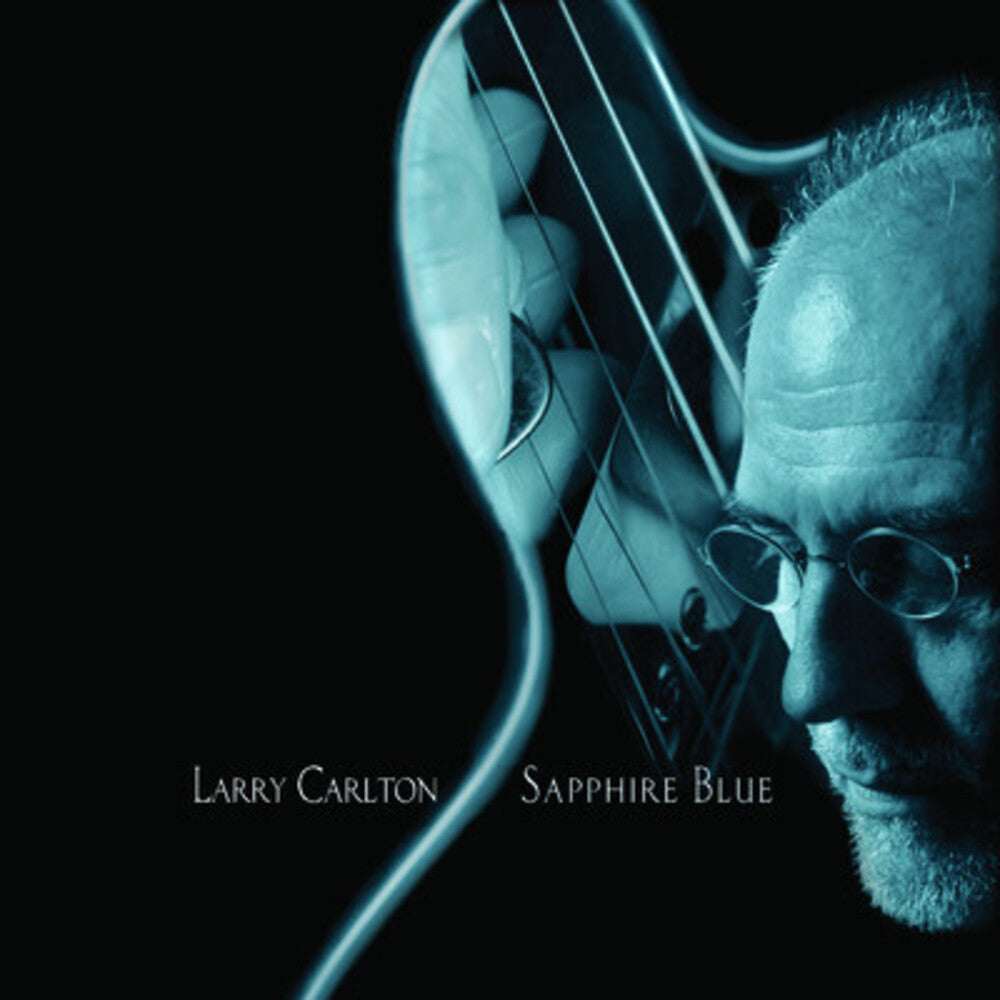 the album cover for Larry Carlton - Saphire Blue