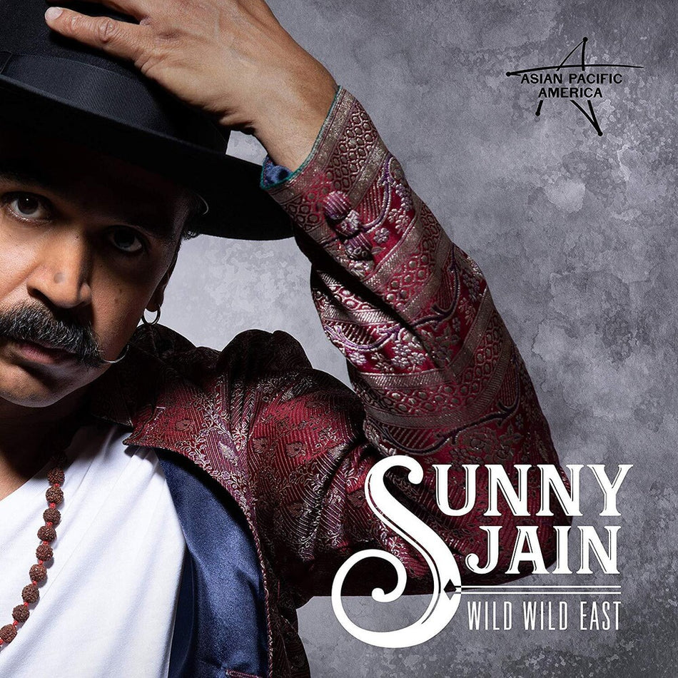 the album cover for Sunny Jain - Wild Wild East