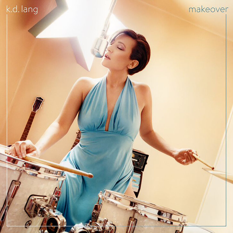 the album cover for k.d. lang - makeover [Transparent Turquoise LP]