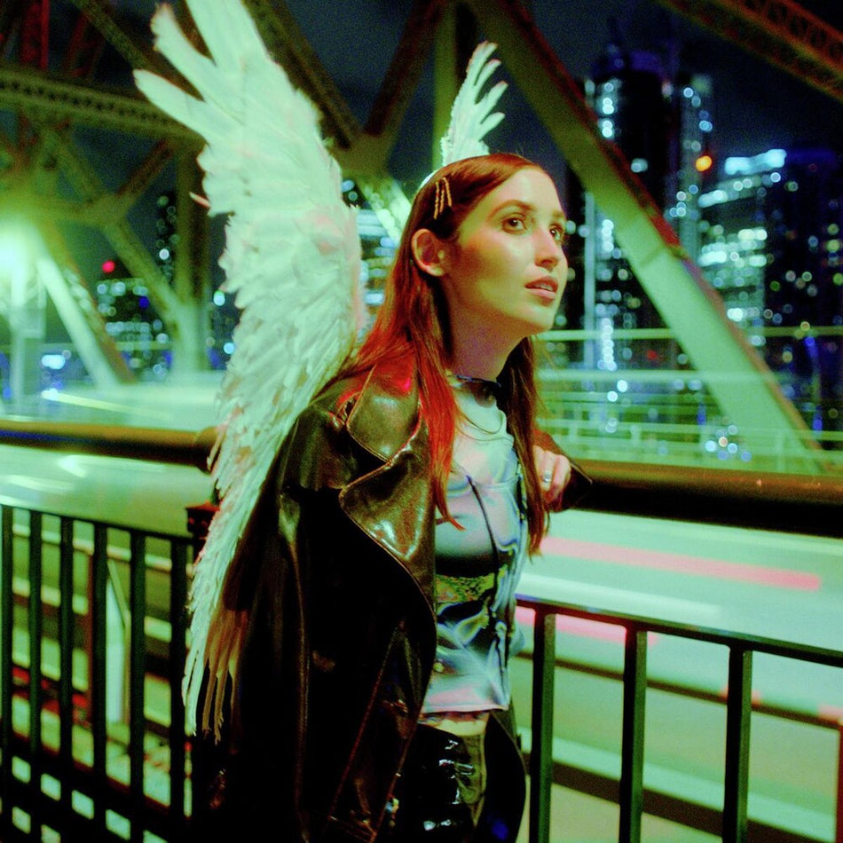 the album cover for Hatchie - Giving The World Away [Coke Bottle Clear LP]