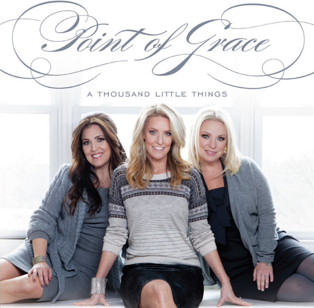 the album cover for Point Of Grace - A Thousand Little Things