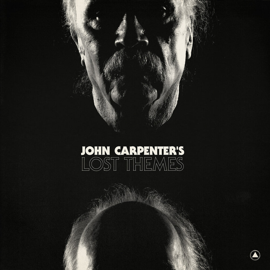 the album cover for John Carpenter - Lost Themes: SB 15 Year Edition [Vortex Blue LP]