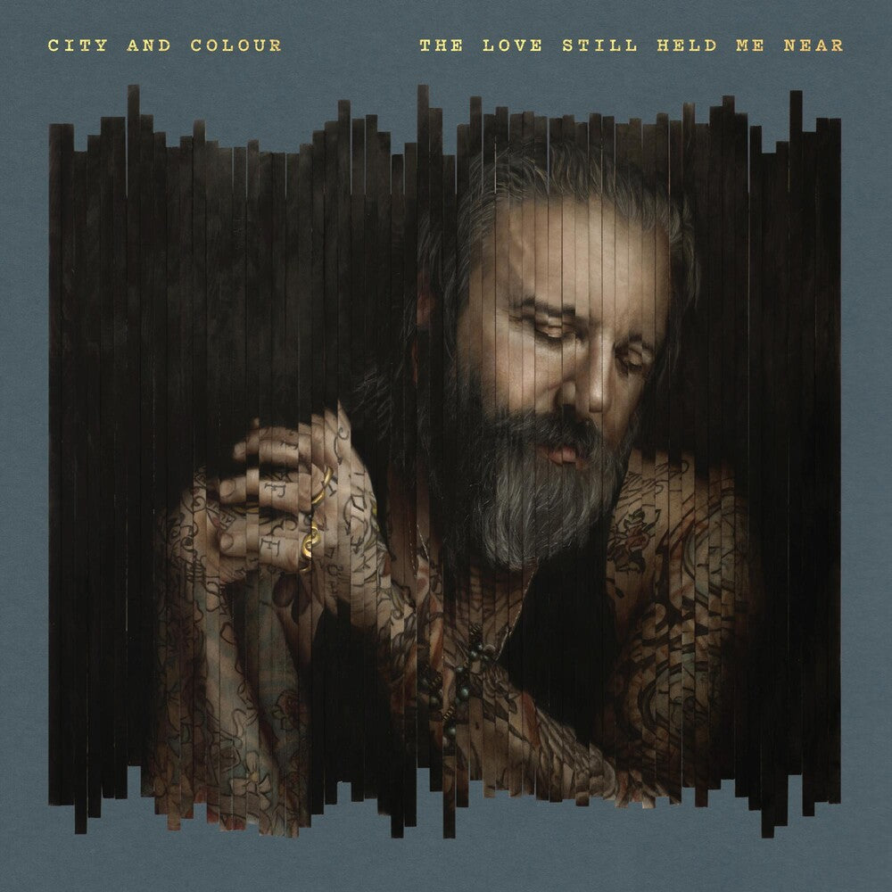 the album cover for City And Colour - The Love Still Held Me Near [Indie Exclusive Limited Edition Milky Clear/White Galaxy 2LP]