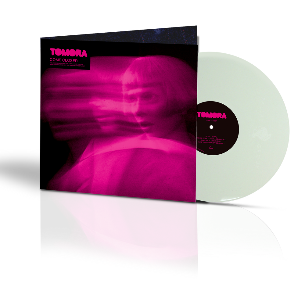 the album cover for Tomora - Come Closer [180 Gram White]