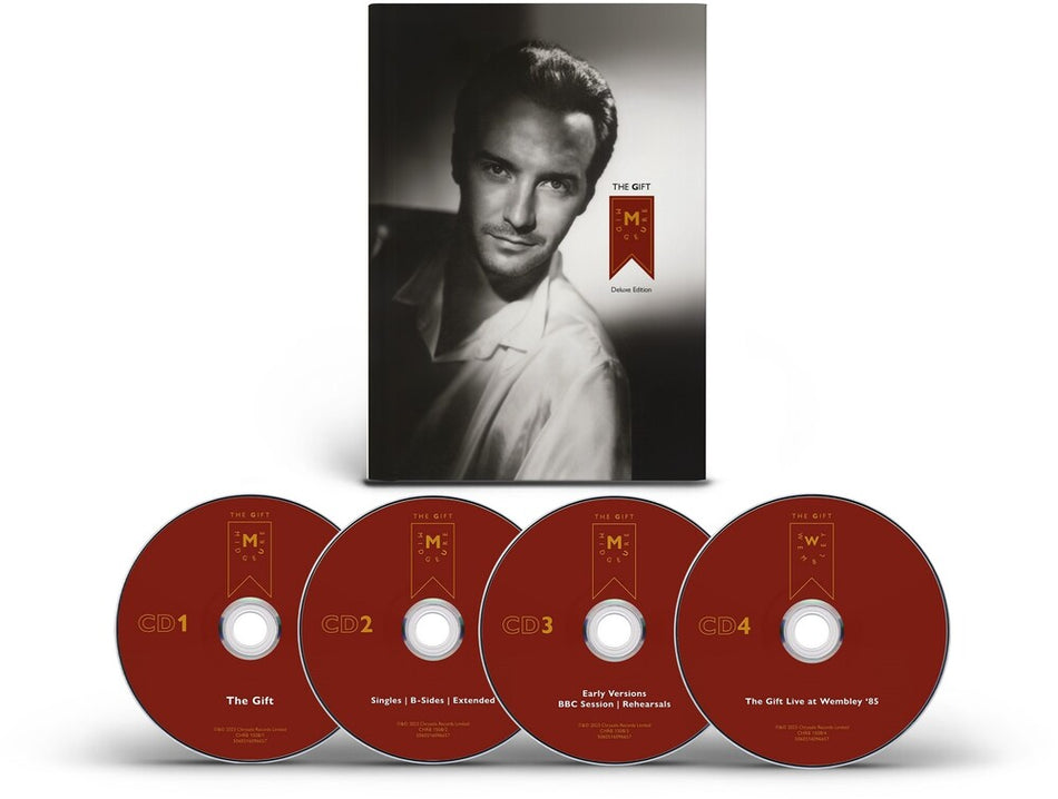 the album cover for Midge Ure - Gift [Deluxe Edition] [Deluxe]