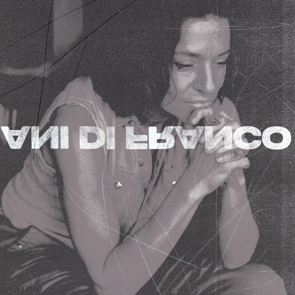 the album cover for ANI DIFRANCO	 - UNPRECEDENTED SH!T [BLACK LP]	