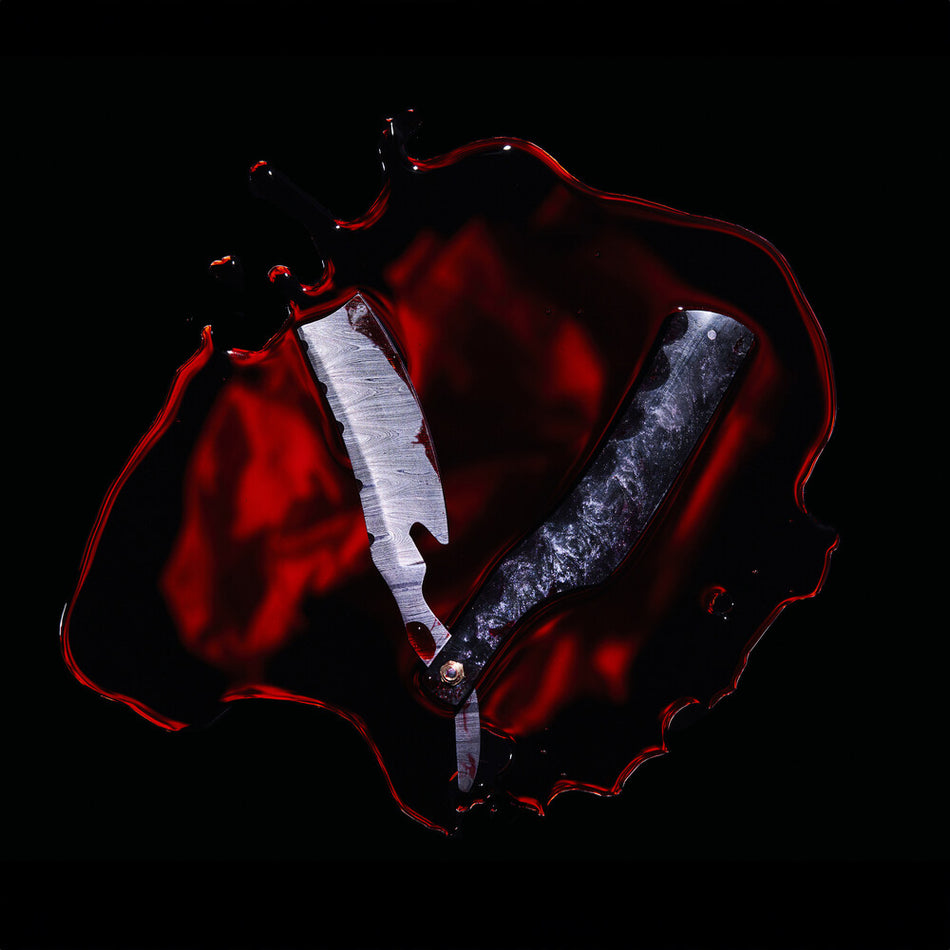 the album cover for Black Veil Brides - Bleeders