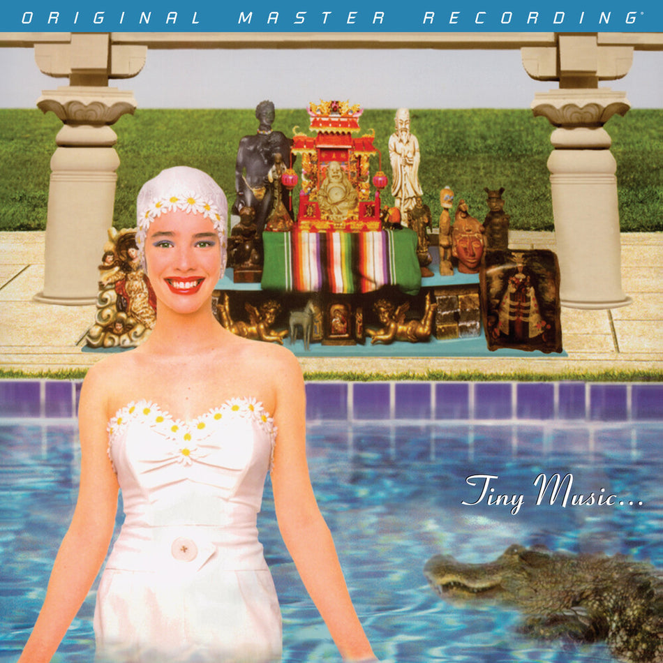 the album cover for Stone Temple Pilots - Tiny Music... Songs from the Vatican Gift Shop