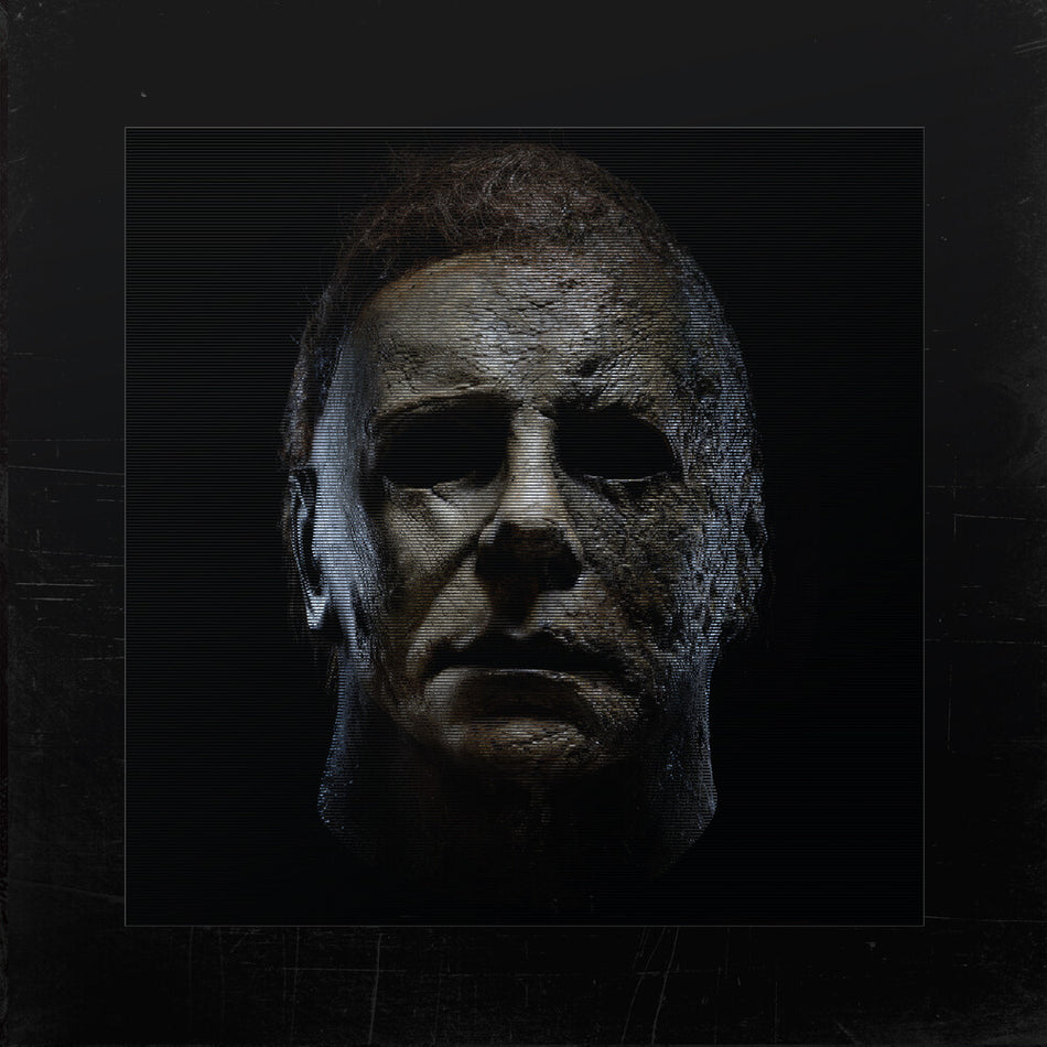 the album cover for John Carpenter  / Carpenter,Cody / Davies,Daniel - Halloween - O.S.T. [Colored Vinyl] (Red) (Exp)