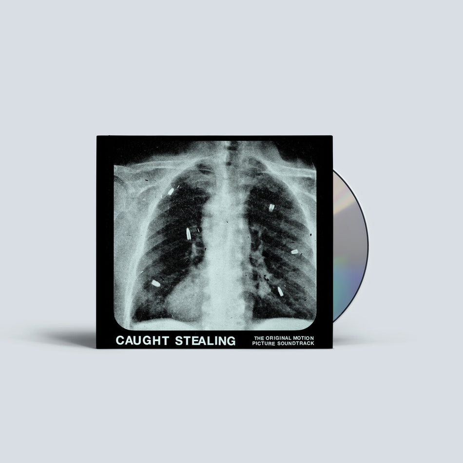 the album cover for IDLES feat. Rob Simonsen - Caught Stealing (The Original Motion Picture Soundtrack)