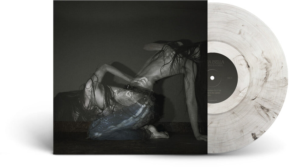 the album cover for Sofia Isella - Something Is A Shell . [Indie Exclusive] [Clear Vinyl] [Indie Exclusive]