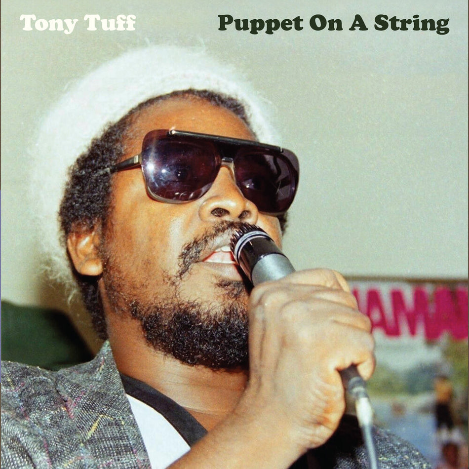 the album cover for Tony Tuff - Puppet On A String (Mod)
