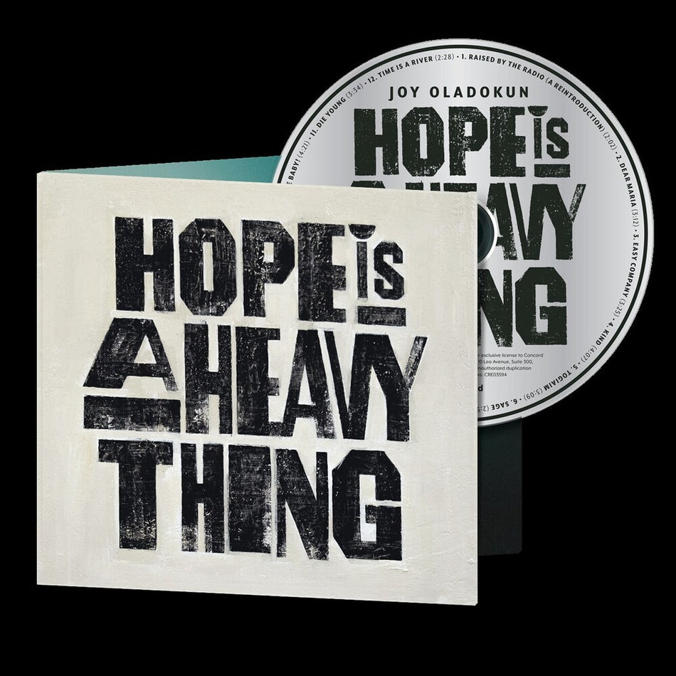 the album cover for Joy Oladokun - Hope Is A Heavy Thing