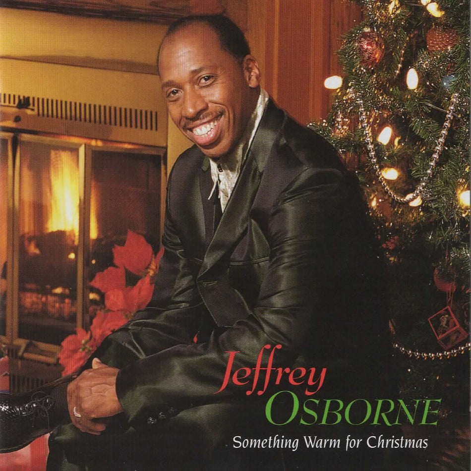 the album cover for Jeffrey Osborne - Something Warm For Christmas [Colored Vinyl] (Grn) [Limited Edition]