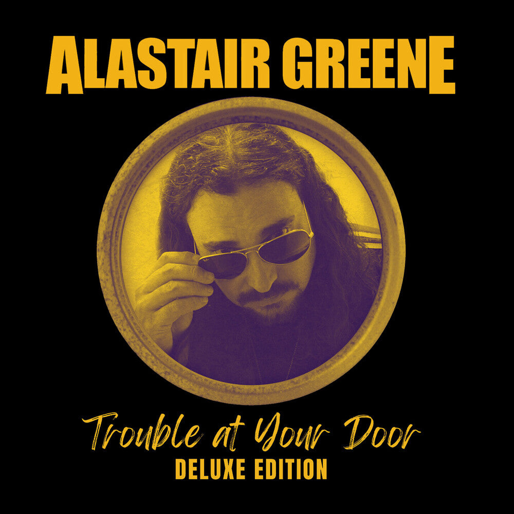 the album cover for Alastair Greene - Trouble At Your Door - Deluxe Edition