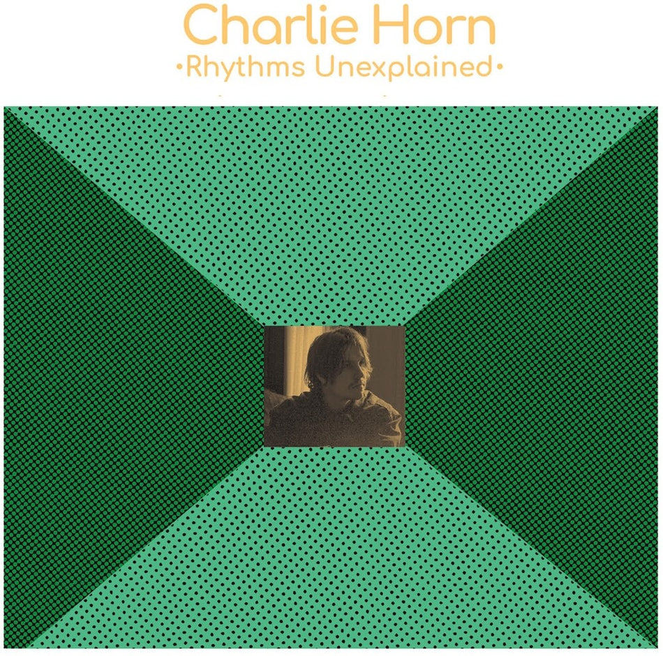 the album cover for Charlie Horn - Rhythms Unexplained